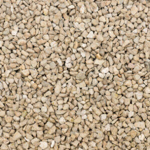 Light beige crushed drain rock surface
