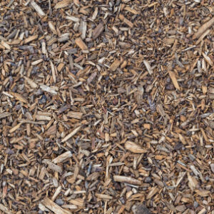 Brown shredded hardwood mulch surface