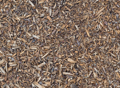 Dry brown shredded wood mulch pieces