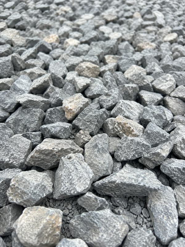 Close-up of angular crushed stone used for driveway base
