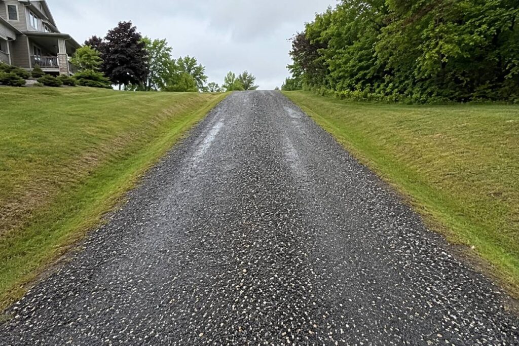 Crowned gravel driveway after light rain